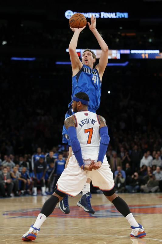 Dirk Shoots Over Carmelo